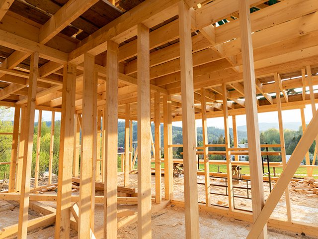 New interior residential wooden construction house framing